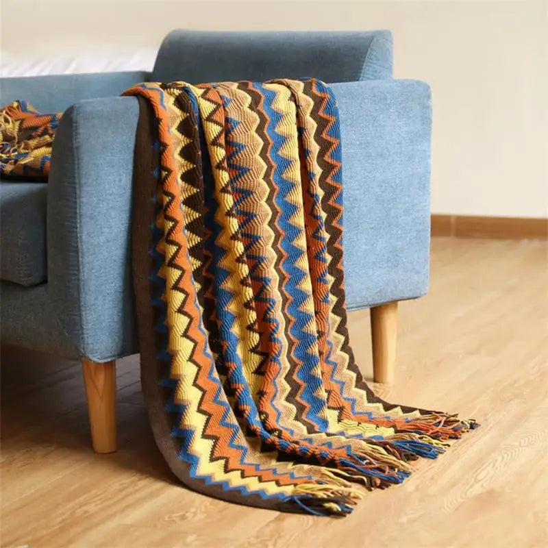 Hand-knitted boho tassel throw blanket
