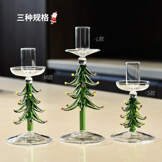 Glass Christmas tree candle holder on a festive table