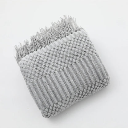 Chunky knit throw blanket with tassels