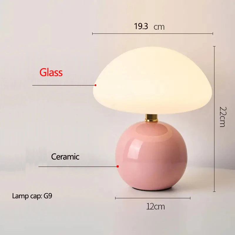 Cream mushroom table lamp on a bedside table