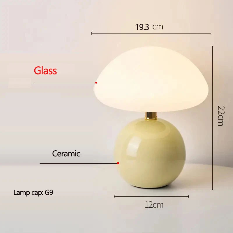 Cream mushroom table lamp on a bedside table