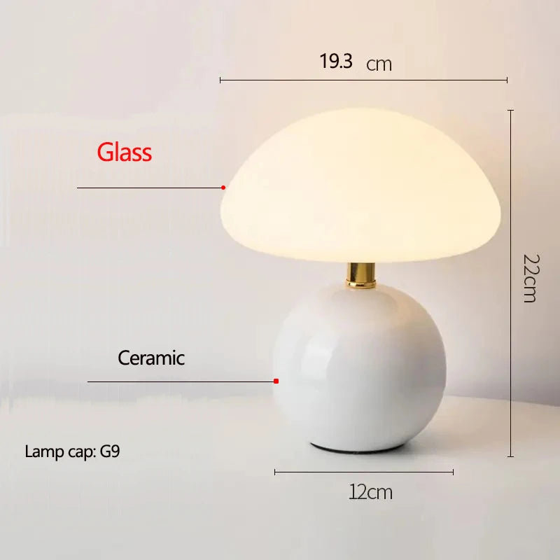 Cream mushroom table lamp on a bedside table