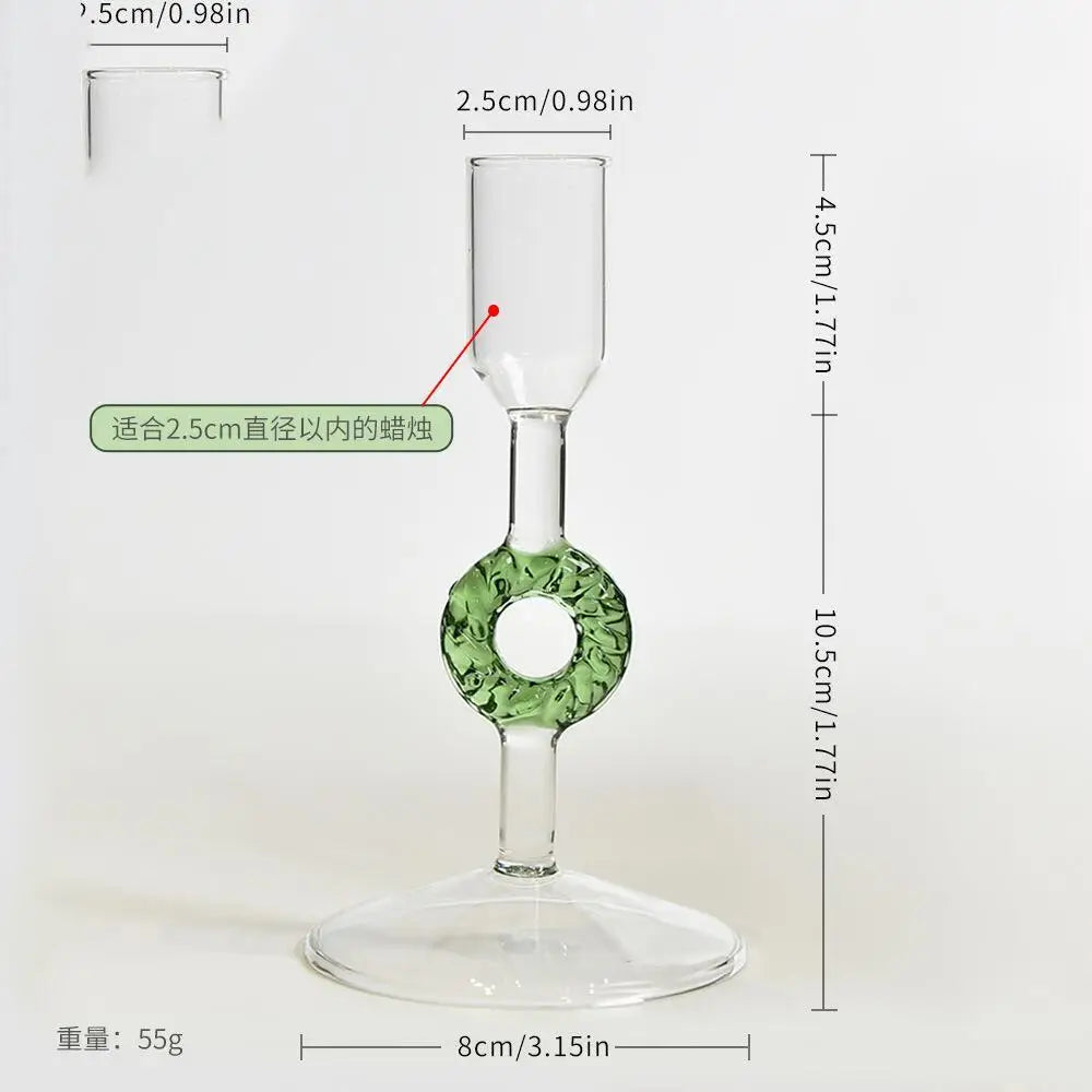 Glass Christmas tree candle holder on a festive table
