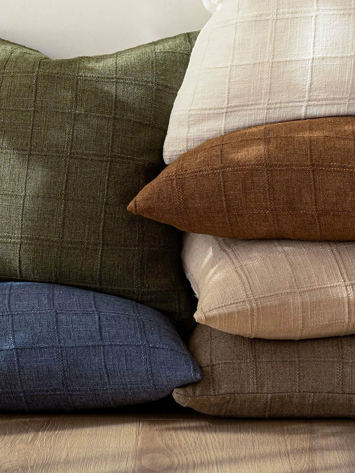 Boho check cushion cover on a sofa