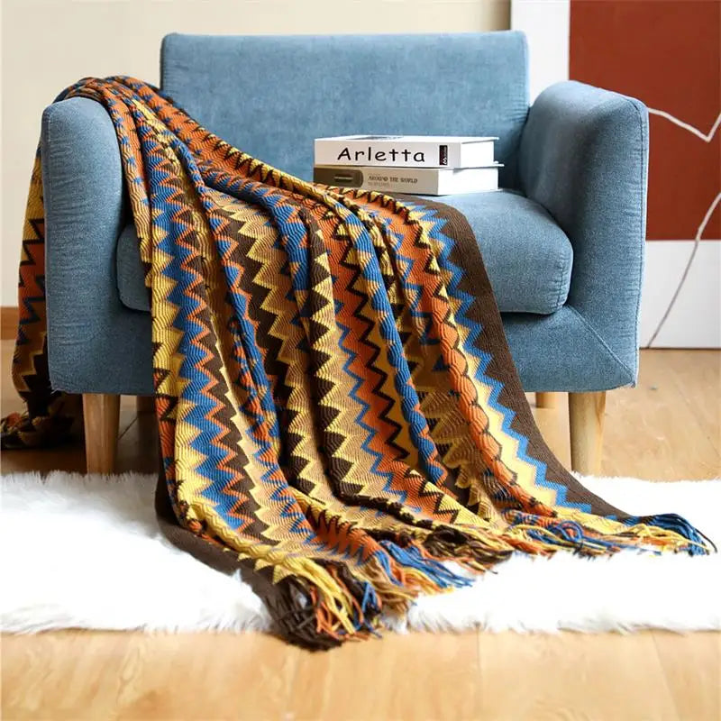 Hand-knitted boho tassel throw blanket