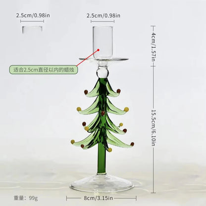 Glass Christmas tree candle holder on a festive table