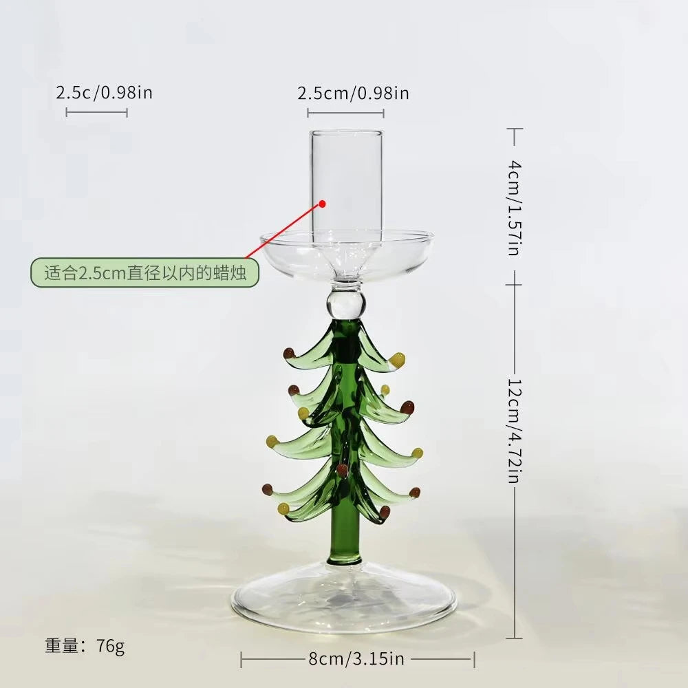 Glass Christmas tree candle holder on a festive table