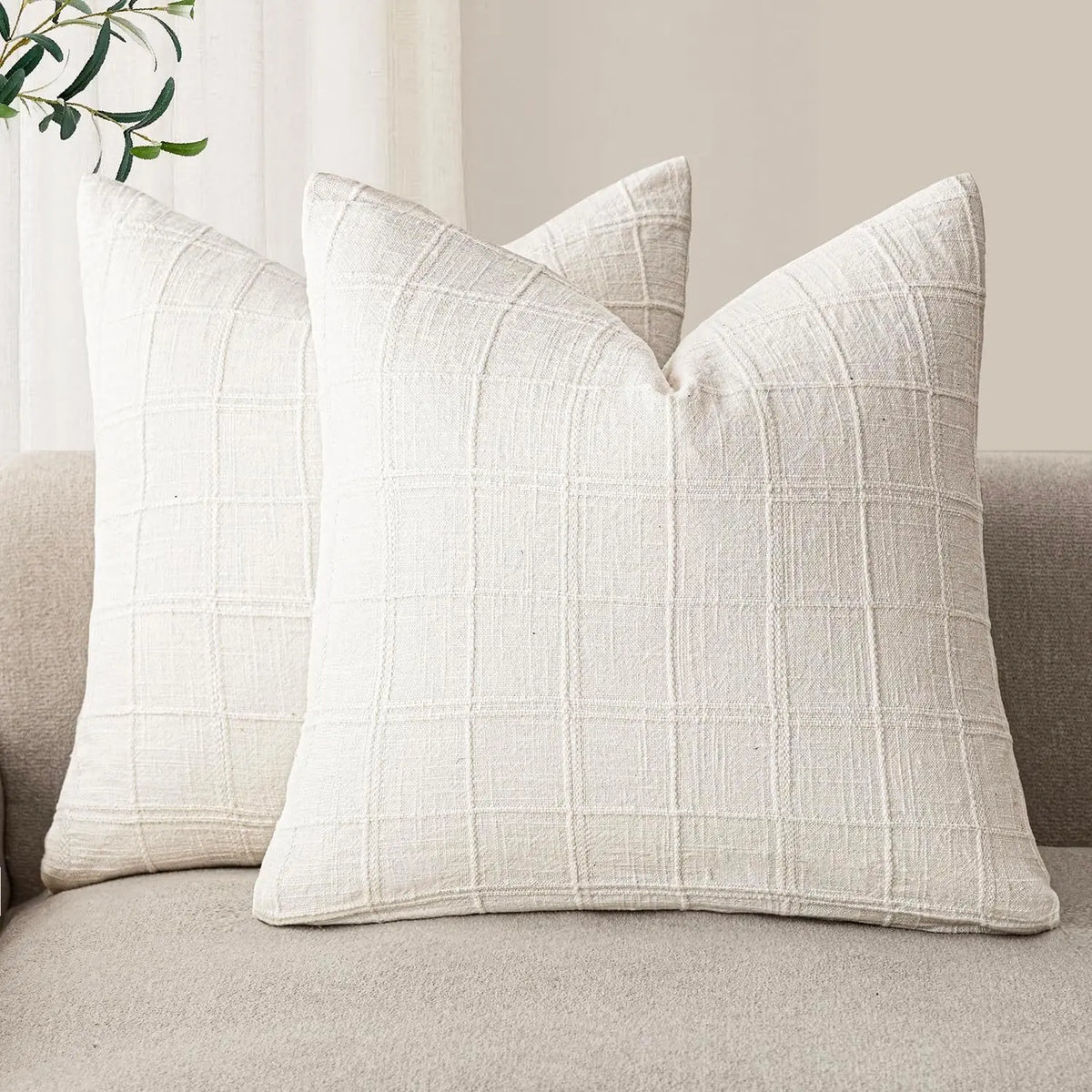 Boho check cushion cover on a sofa