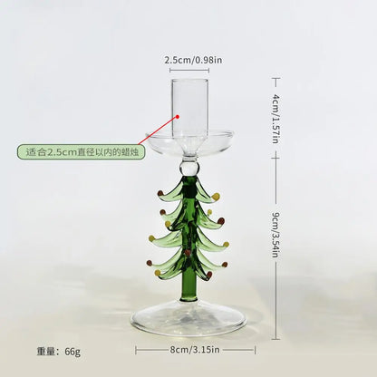 Glass Christmas tree candle holder on a festive table