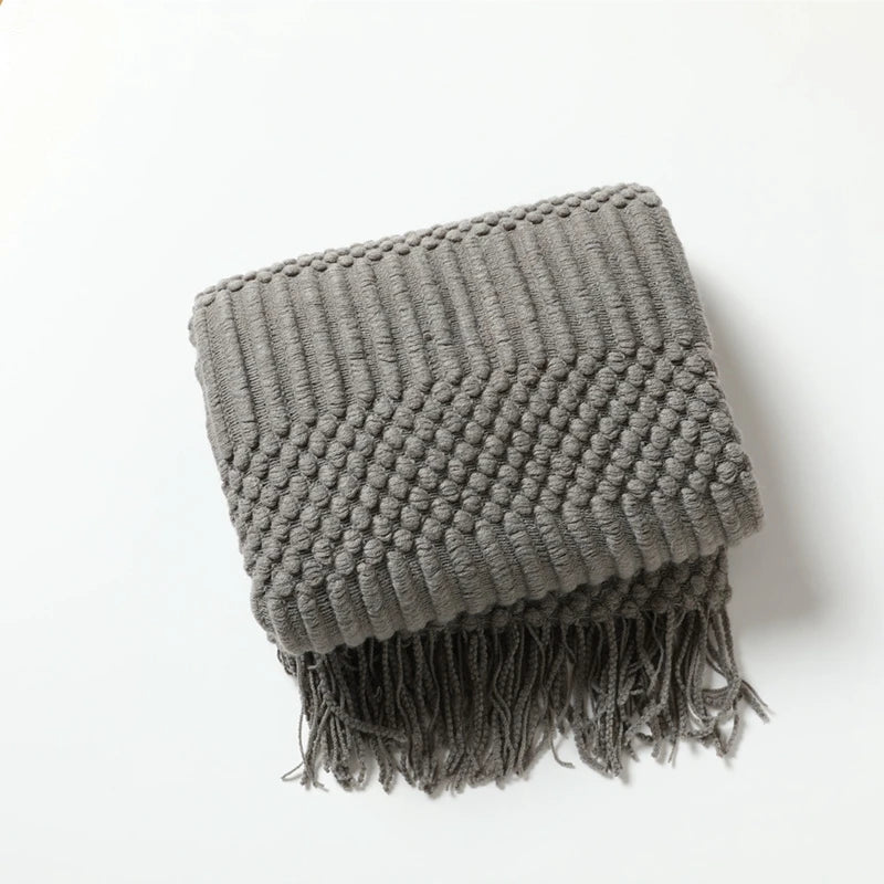 Chunky knit throw blanket with tassels