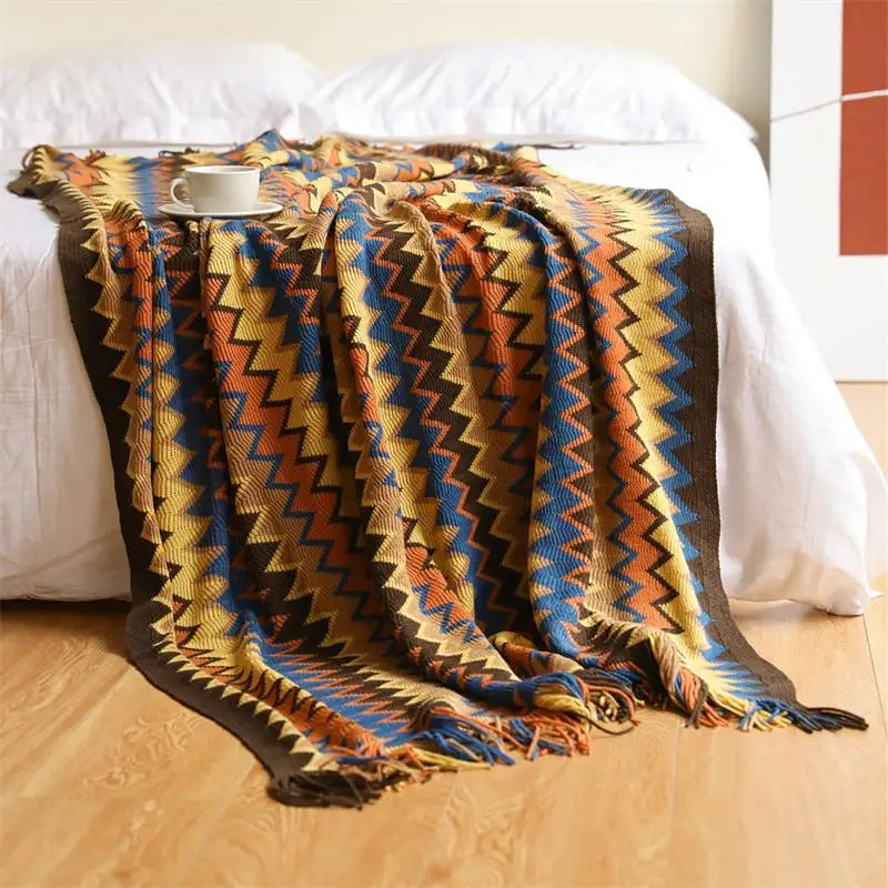 Hand-knitted boho tassel throw blanket