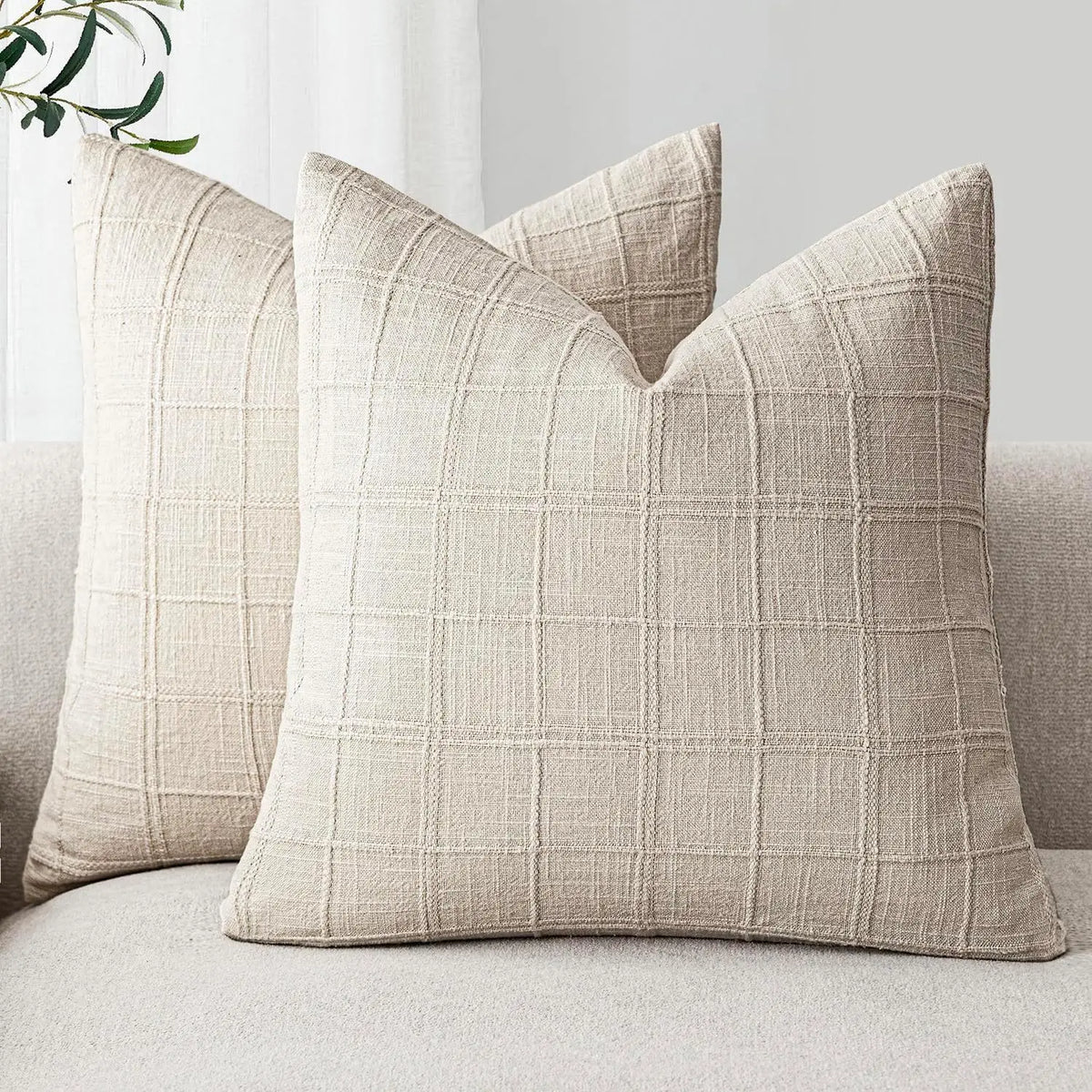 Boho check cushion cover on a sofa