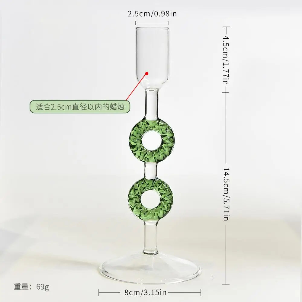 Glass Christmas tree candle holder on a festive table