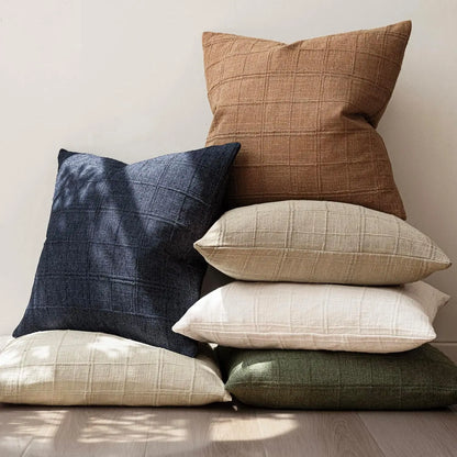 Boho check cushion cover on a sofa