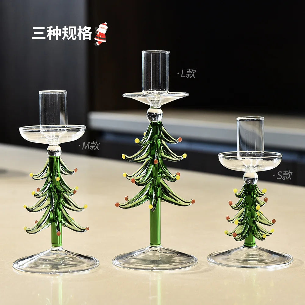 Glass Christmas tree candle holder on a festive table
