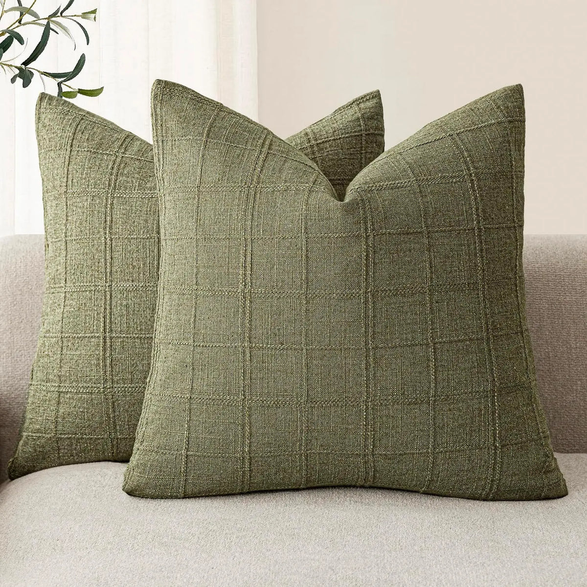 Boho check cushion cover on a sofa