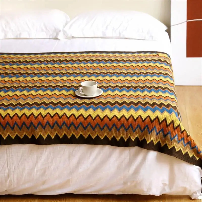 Hand-knitted boho tassel throw blanket