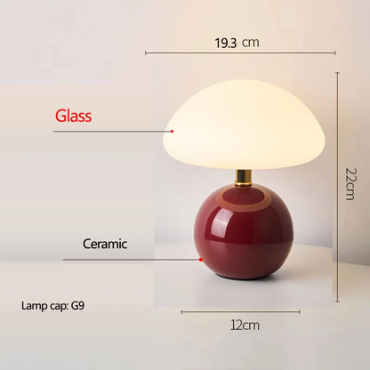 Cream mushroom table lamp on a bedside table