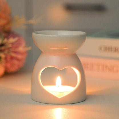 White ceramic oil burner with cut-out pattern
