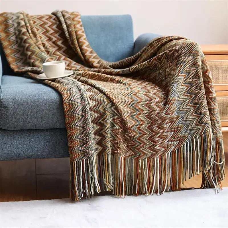 Hand-knitted boho tassel throw blanket