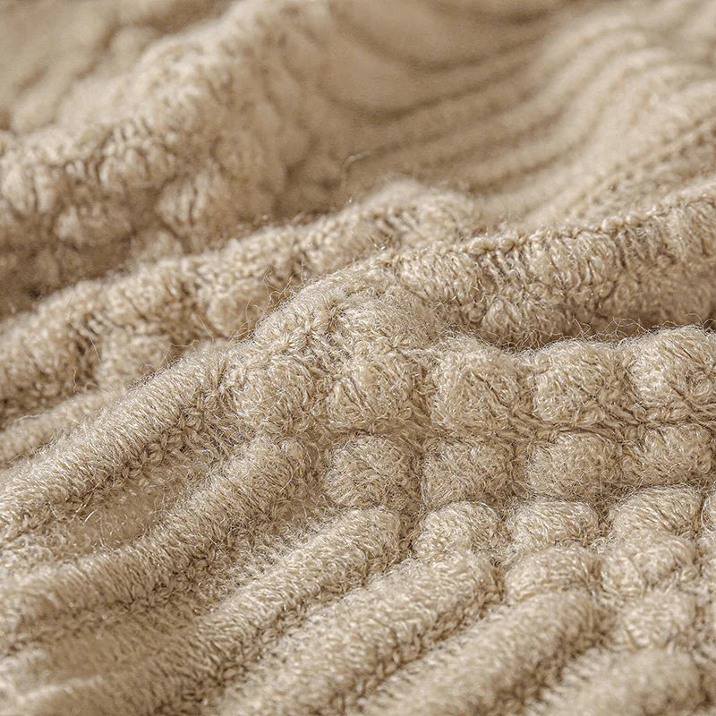 Chunky knit throw blanket with tassels