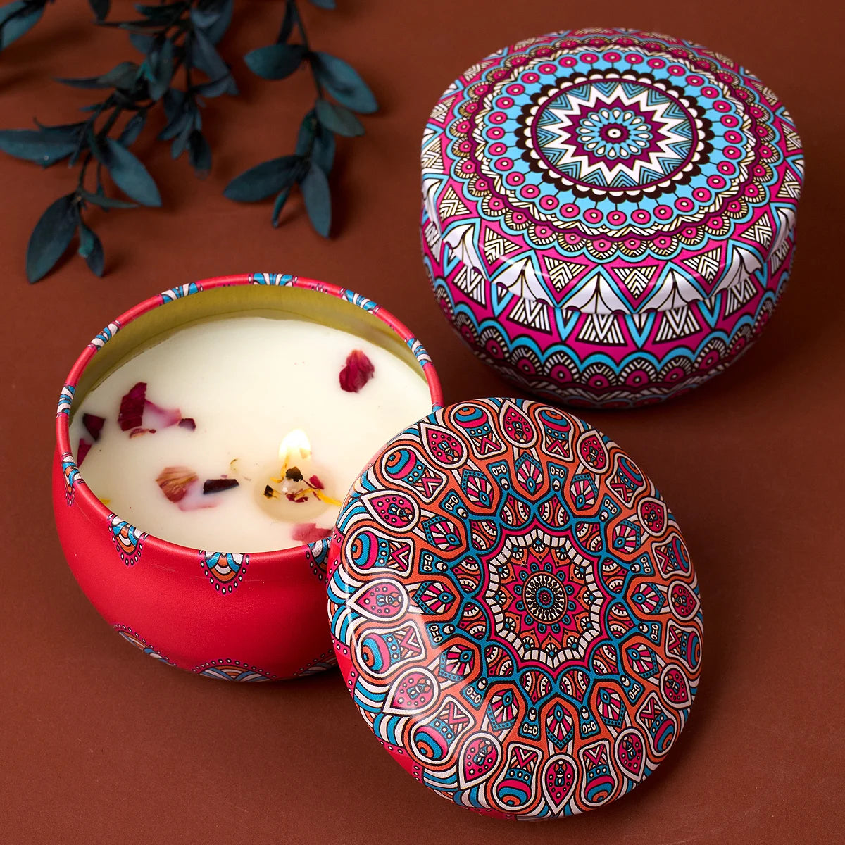 Set of four vintage-style flower scented candle jars